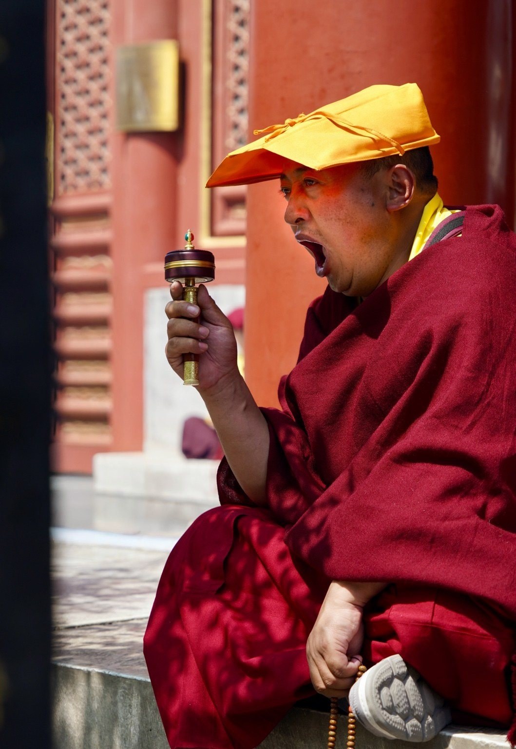 A Buddhist monk yawning in Beijing